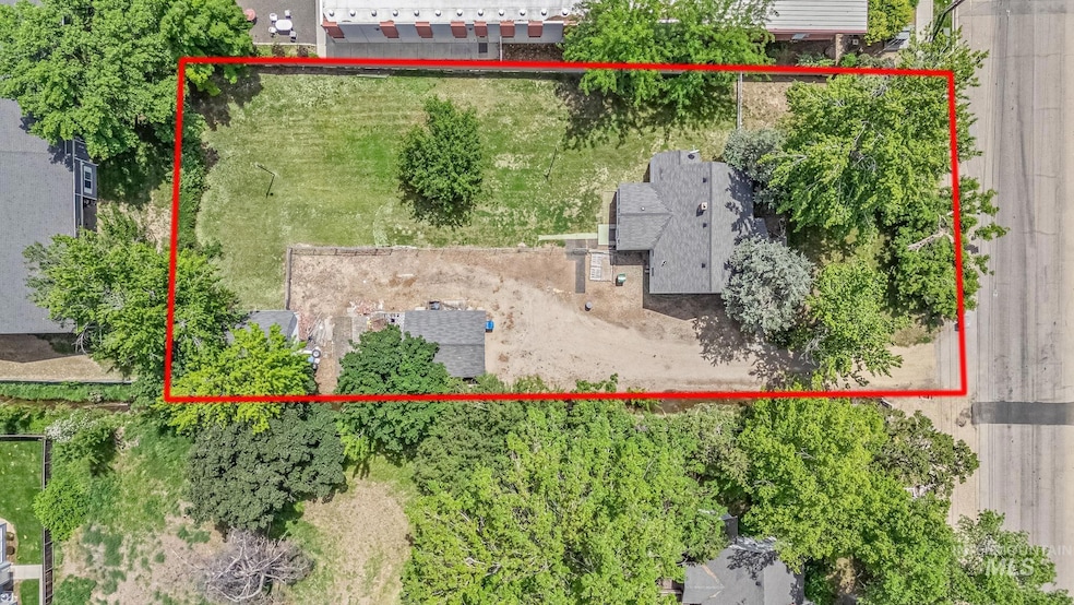Aerial overview of property's location featuring property boundaries highlighted