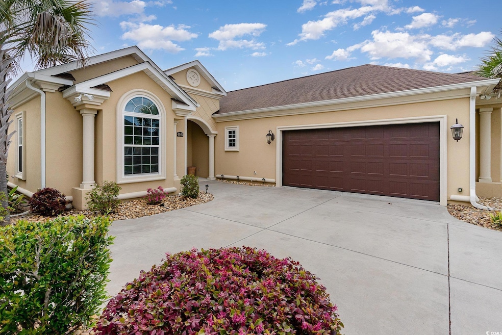 Ranch-style house featuring roof with shingles, a garage, driveway, and stucco siding