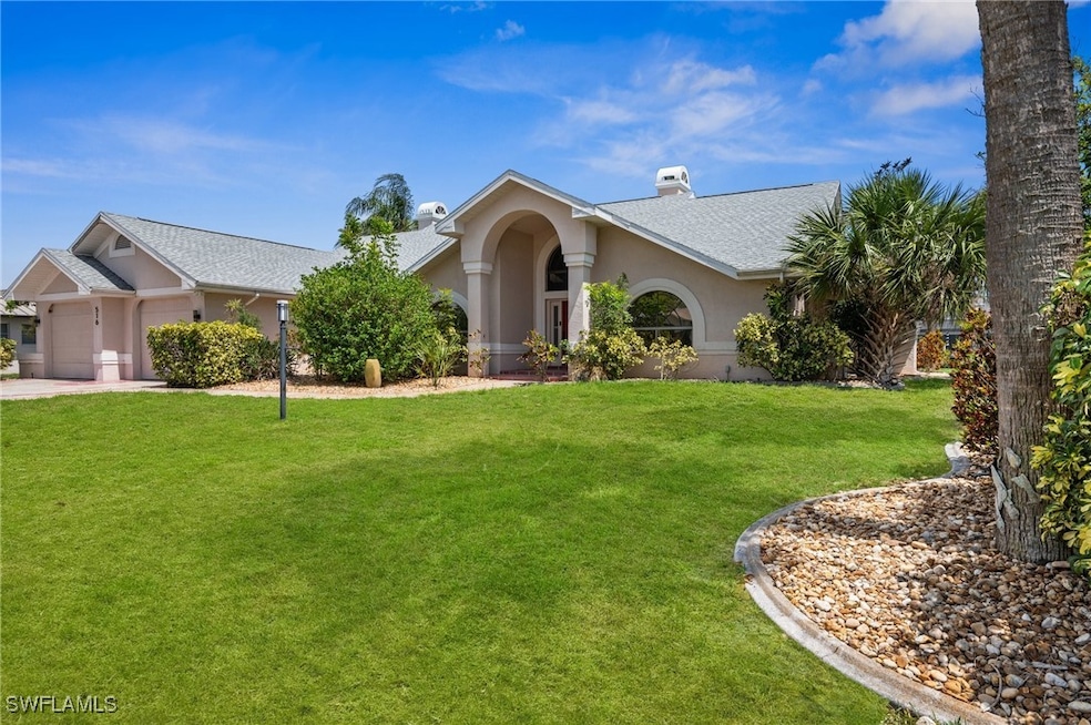 View of front of property featuring an attached ga