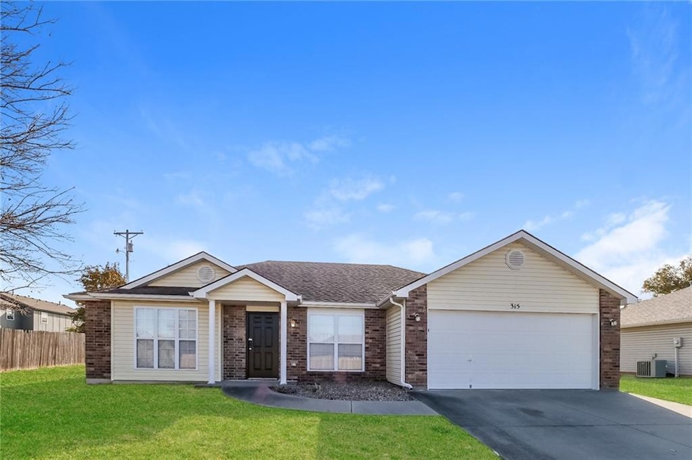 315 E Elm St, Raymore, MO 64083 - photo 1