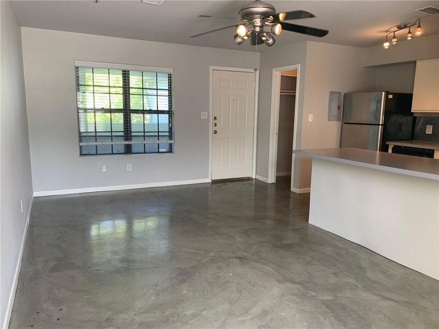 Kitchen featuring freestanding refrigerator, fini
