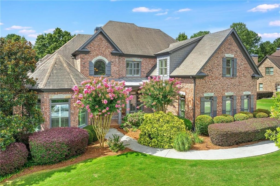 View of front of property with 4-sides brick and a