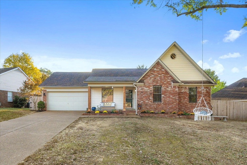 View of front of property with a garage