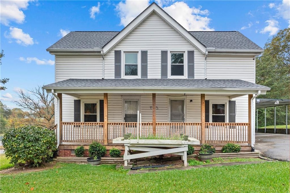 View of front of property featuring a porch and a 
