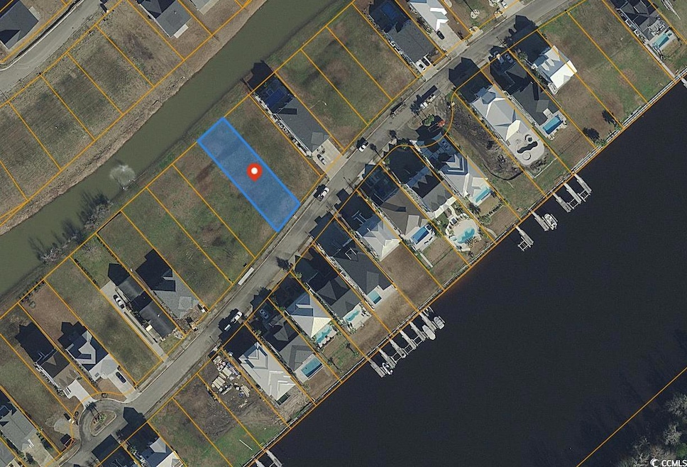 Aerial overview of property's location with property parcel outlined