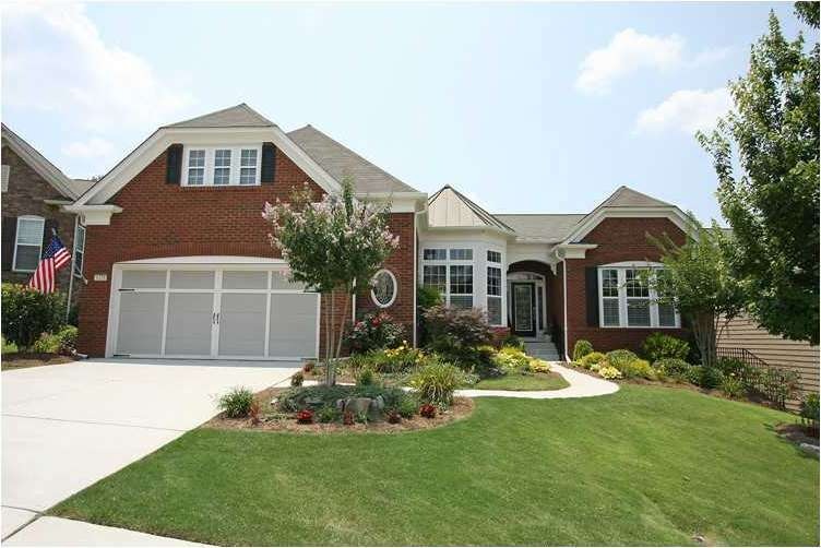 Exterior Front. An elegant, traditional red brick 