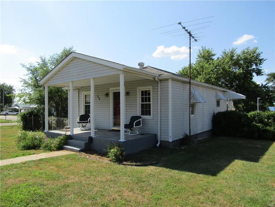 Home on large corner lot; has a detached garage