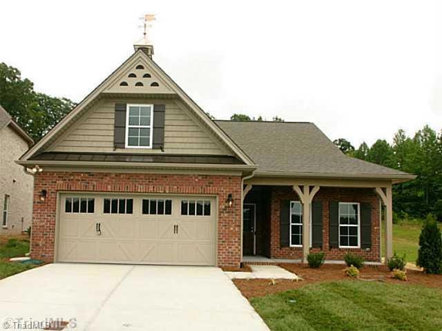 Exterior Front. Beautiful French country style , all brick golf villa