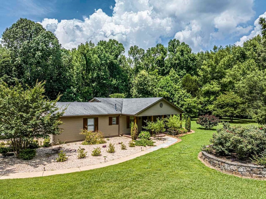 View of front of property with a front yard