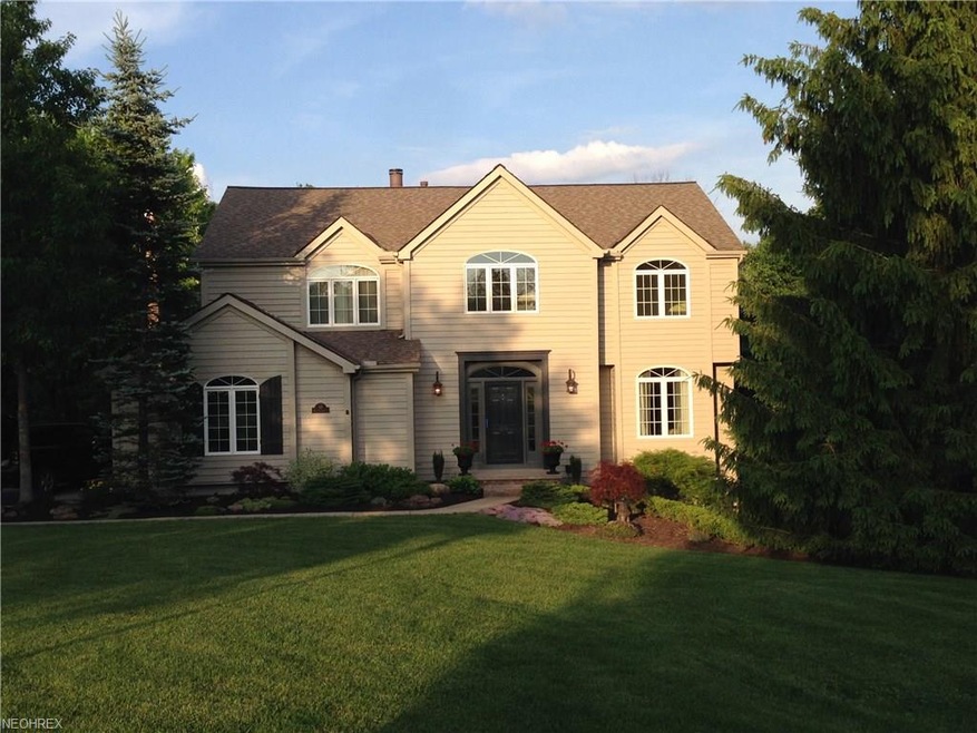 Spectacular view of front! Sits back off of street
