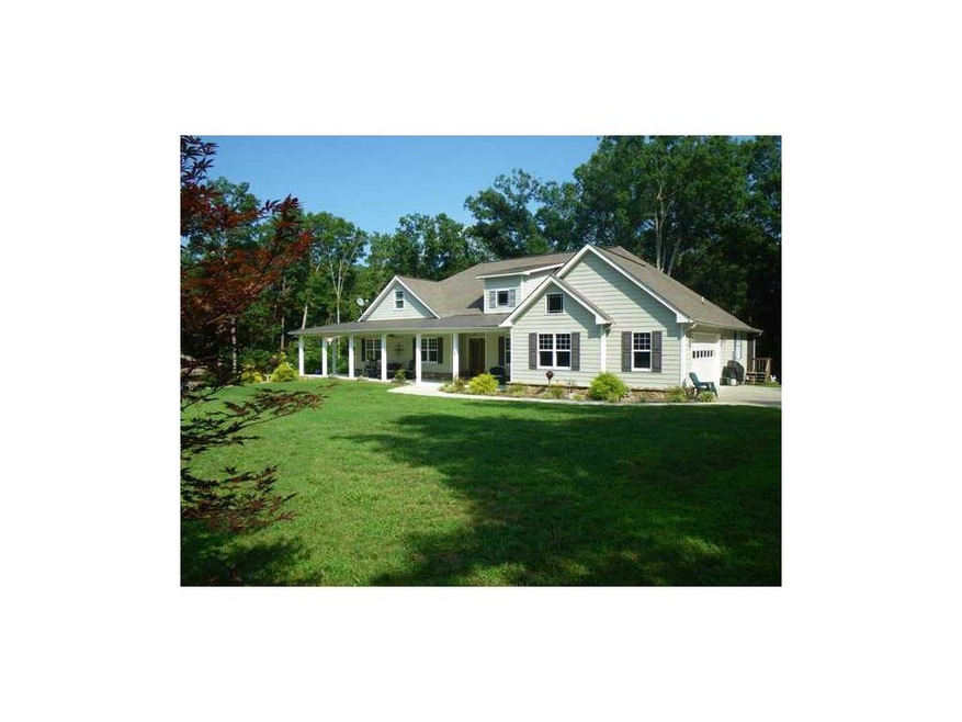 Exterior Front. Level front yard with low maintena