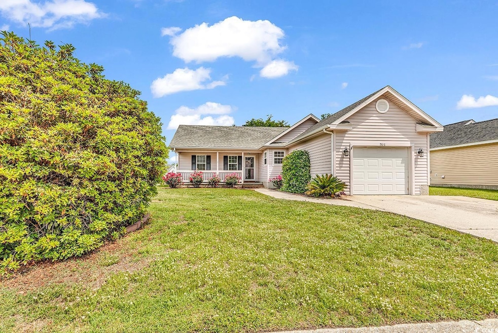 Single story home with concrete driveway, an attac