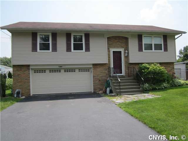 Exterior Front. Beautiful 4 Bed Room Raised Ranch.