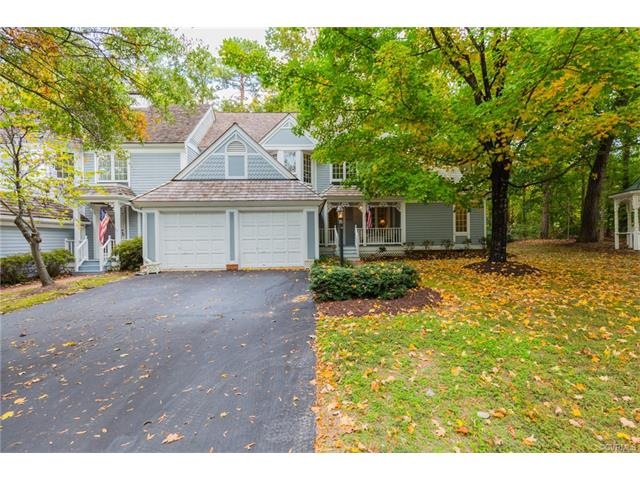 Front Exterior--cedar shake roof, paved driveway, 