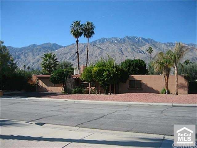 Front of home with mountain view