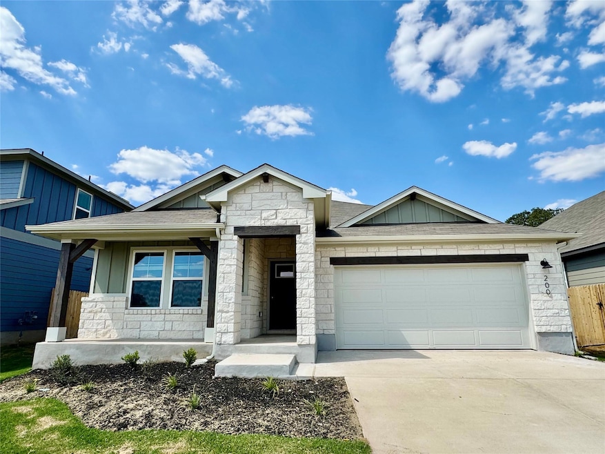 200 Coopers Hawk Crest, Cedar Creek, TX 78612 - photo 1