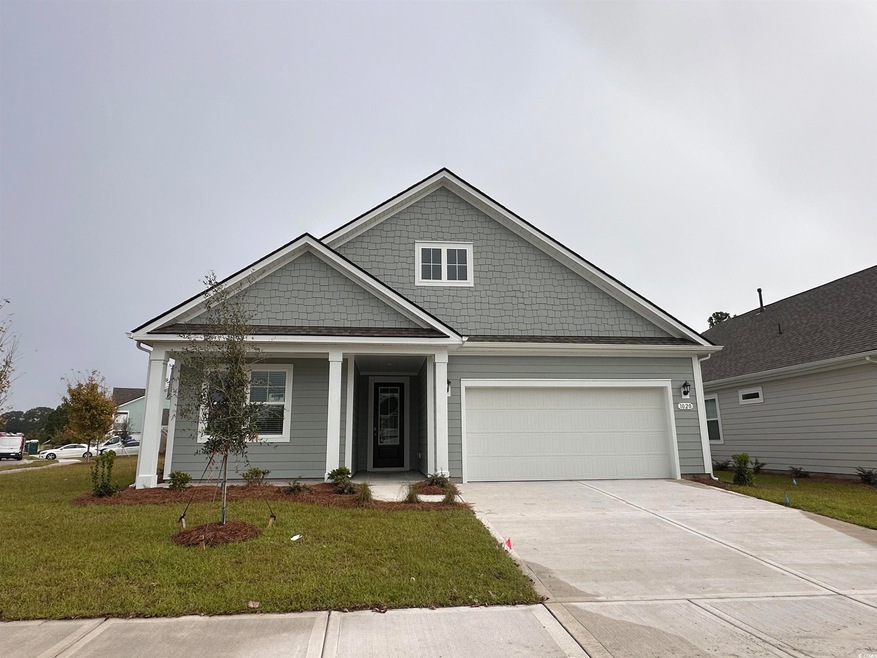 View of front of property featuring a front yard a