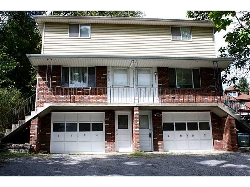 Exterior Front. Great Brick/Frame Duplex each with