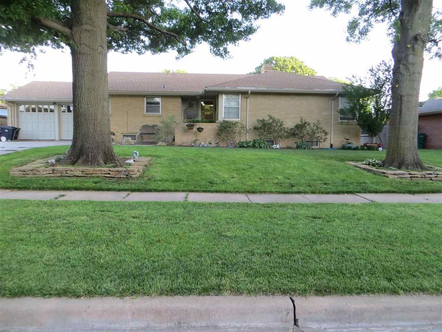 Brick ranch. 2 car garage. Nice landscaping. Beaut