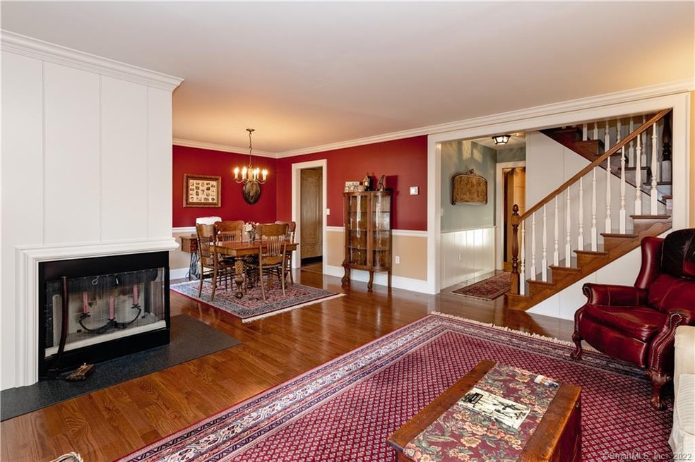 The living room and dining room. Hardwood flooring