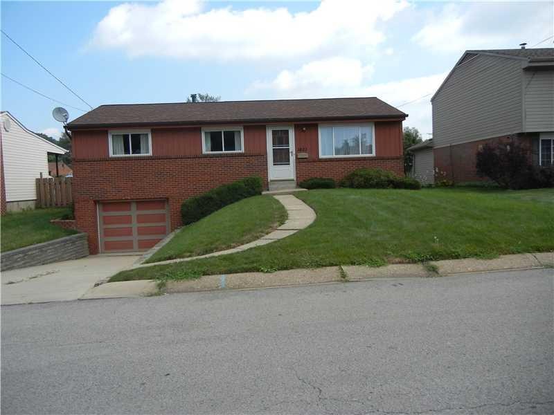 Exterior Front. Brick ranch, newer windows and roo