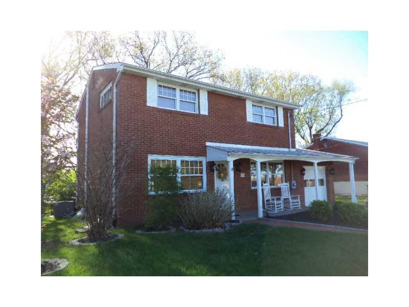 Exterior Front. Cov Front porch on this traditiona
