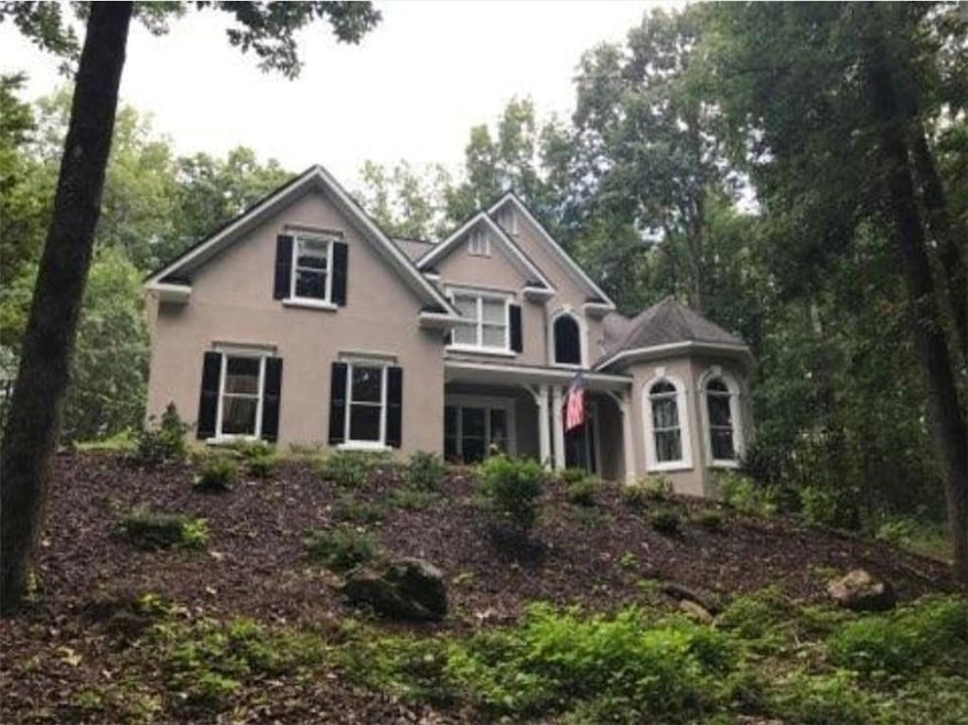View of front of house with stucco siding
