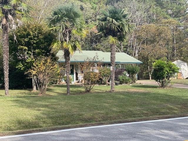 View of front of home featuring a front yard
