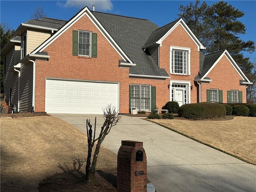 View of front property featuring a garage