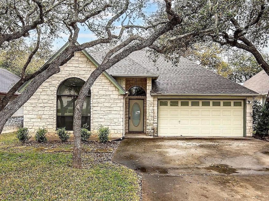 French country inspired facade featuring stone si