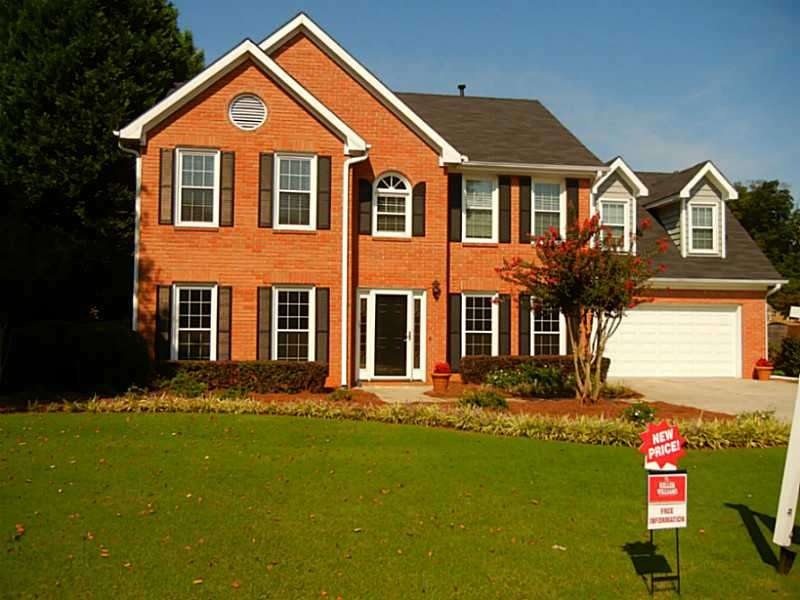Exterior Front. Red Brick Home