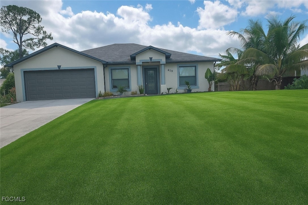 818 Albert Ave, Lehigh Acres, FL 33971 - photo 1