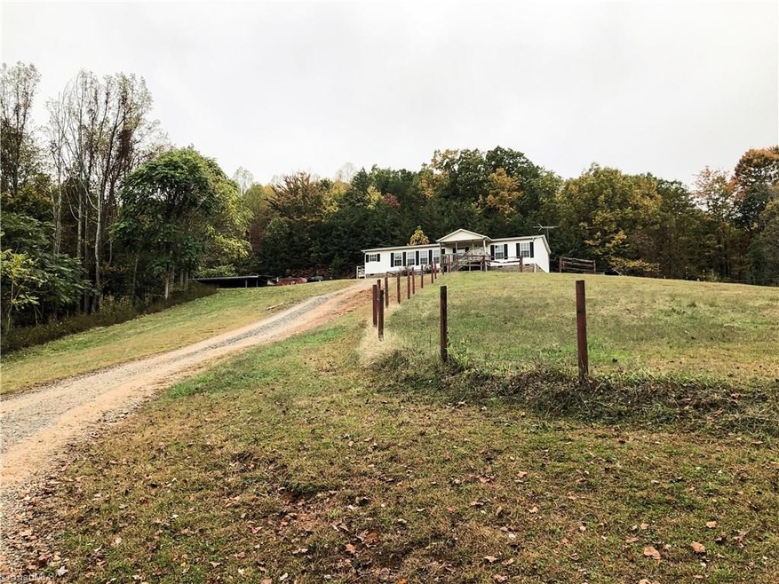 Welcome to 193 Roughrider Trail Mt Airy NC secluded home sits way back off the road on 35Ac.