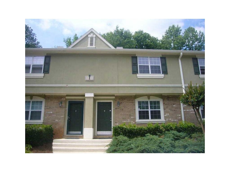 Exterior Front. 6900 Roswell Road, Unit I-6, is lo