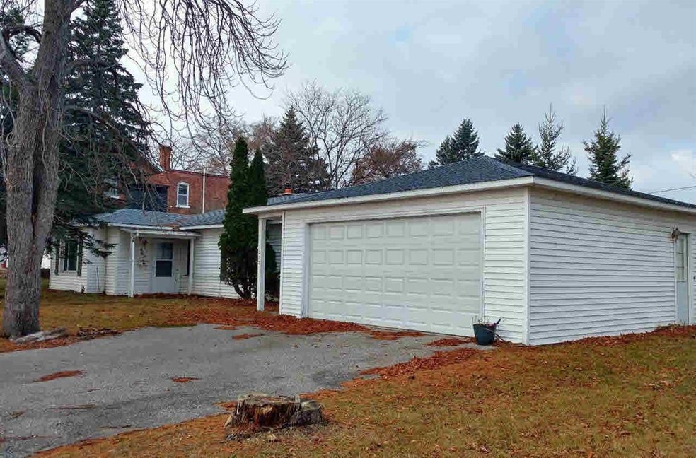 212 W Dwight St, Oscoda, MI 48750 - photo 1