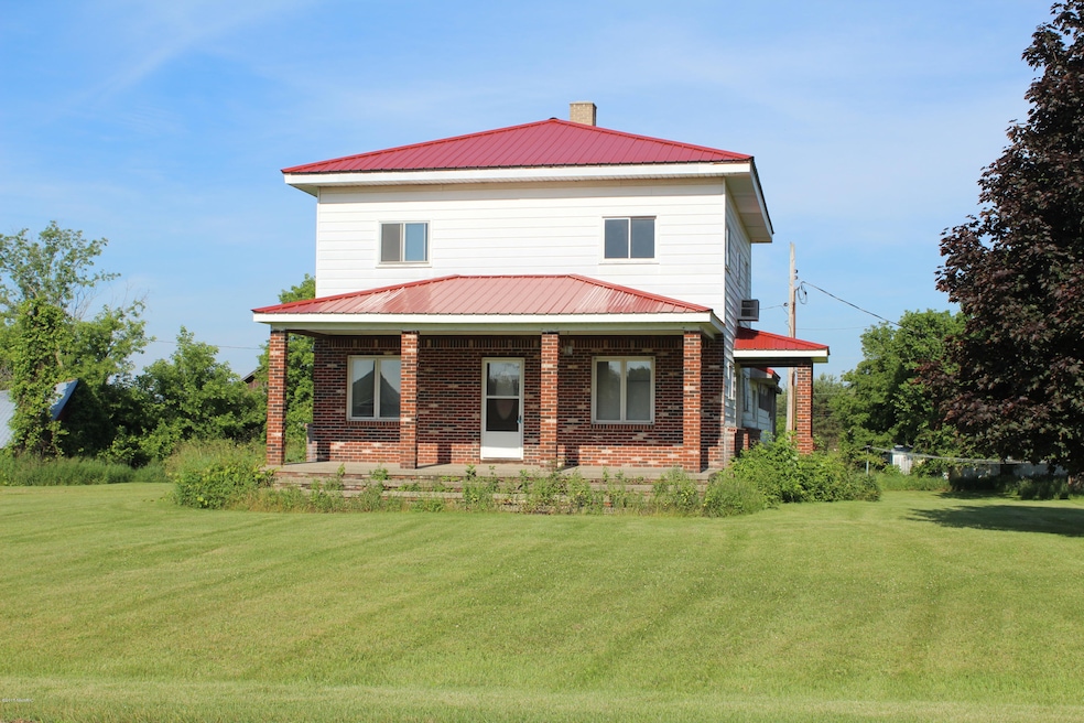 8535 Hubbardston Rd, Hubbardston, MI 48845 - photo 1