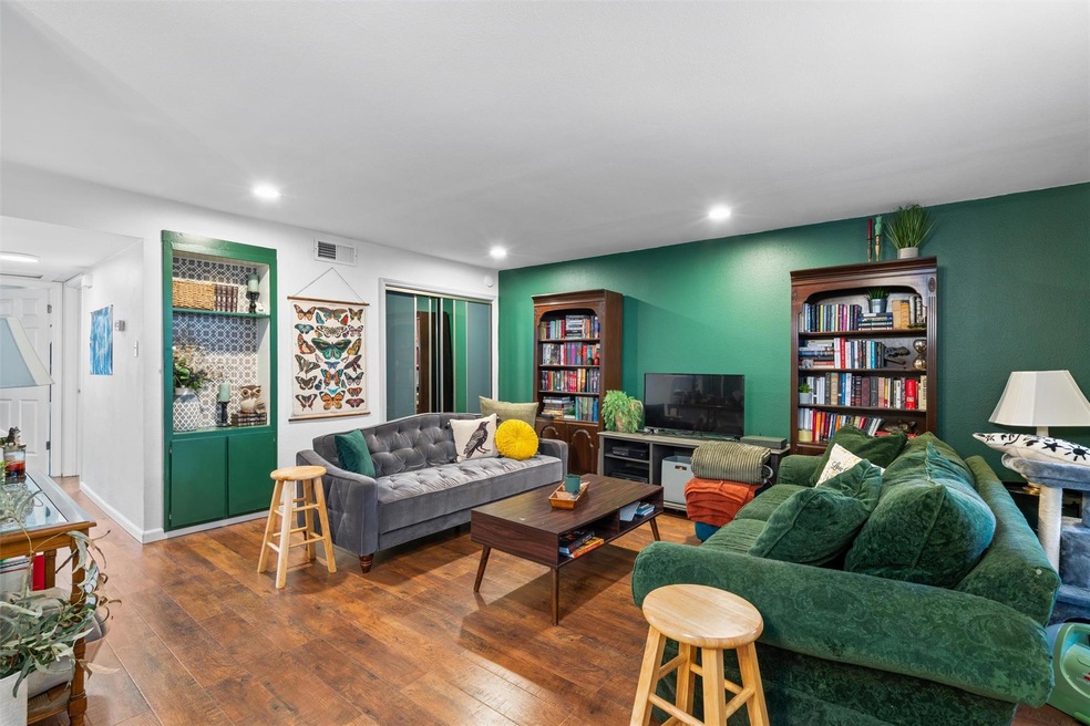 Living room featuring hardwood / wood-style floor