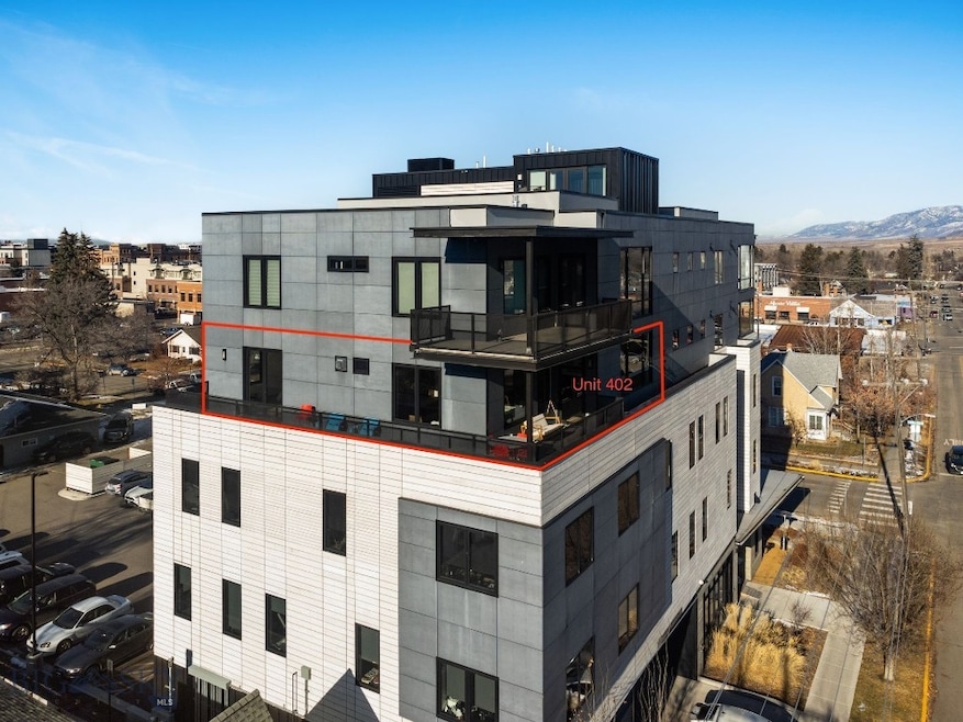 Unit 402 with South and East Facing wrap-around deck.