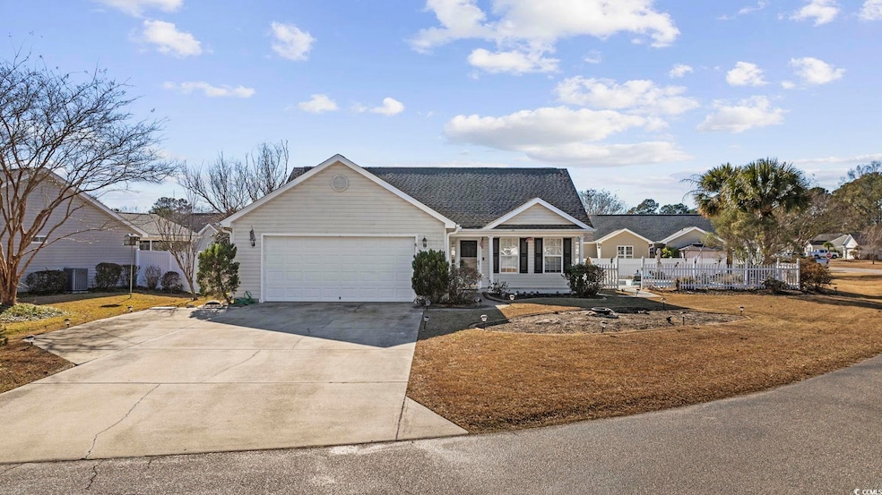 Ranch-style home featuring a garage