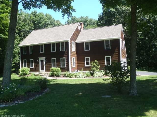 Exterior Front. Beautifully landscaped Saltbox on 