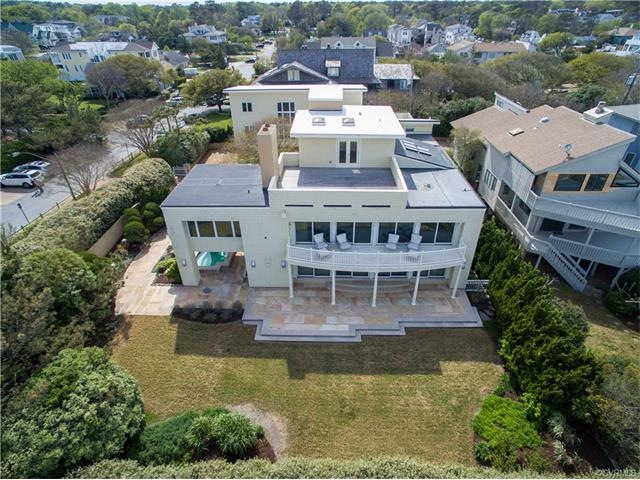 Sited on a double lot with sweeping views of the o