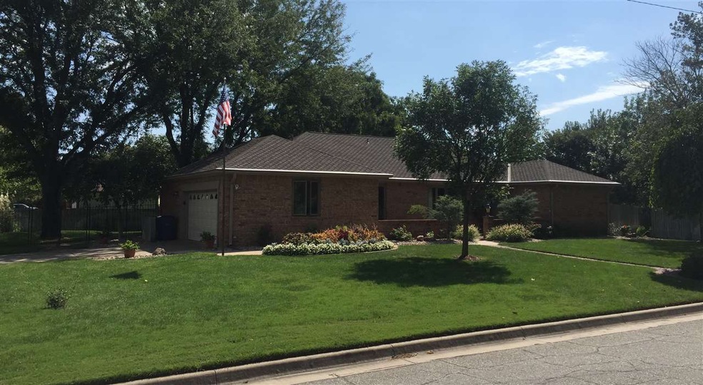 Meticulously maintained with mature trees, this co