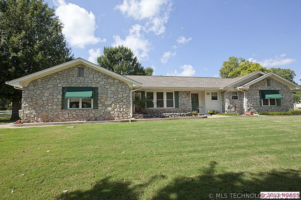 Meticulously maintained on beautiful corner lot wi