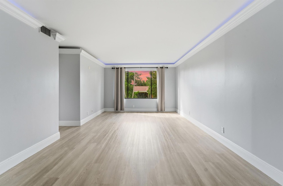 11477 NW 39th Ct unit 203, Coral Springs, FL 33065 - photo 1