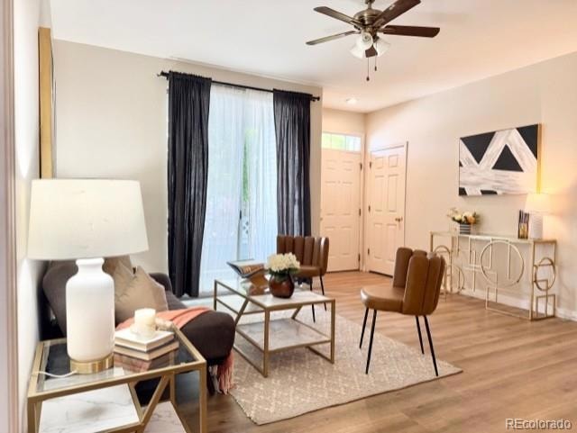 Living room, access to private, covered patio, and entry to your new home.