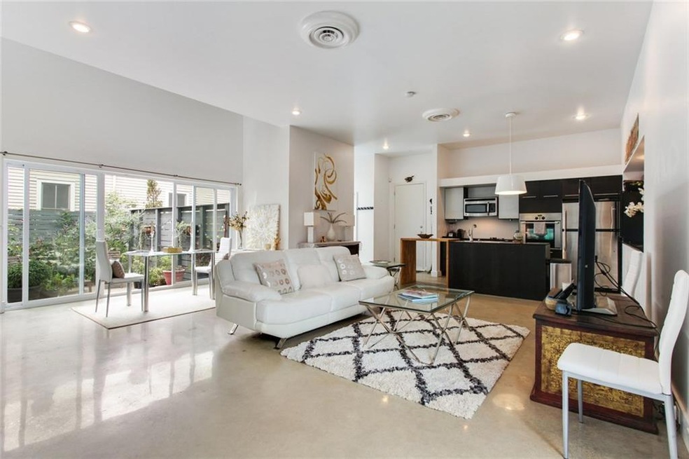 CHIC AND SLEEK OPEN FLOORPLAN! 1/2 BATH AND STORAG