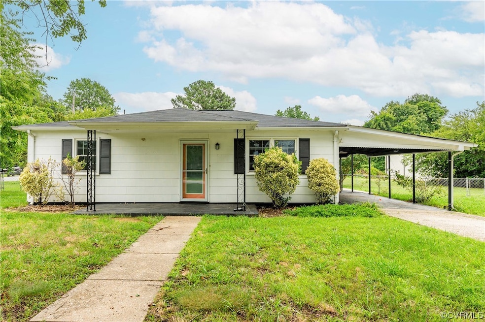 Single story home with a front yard