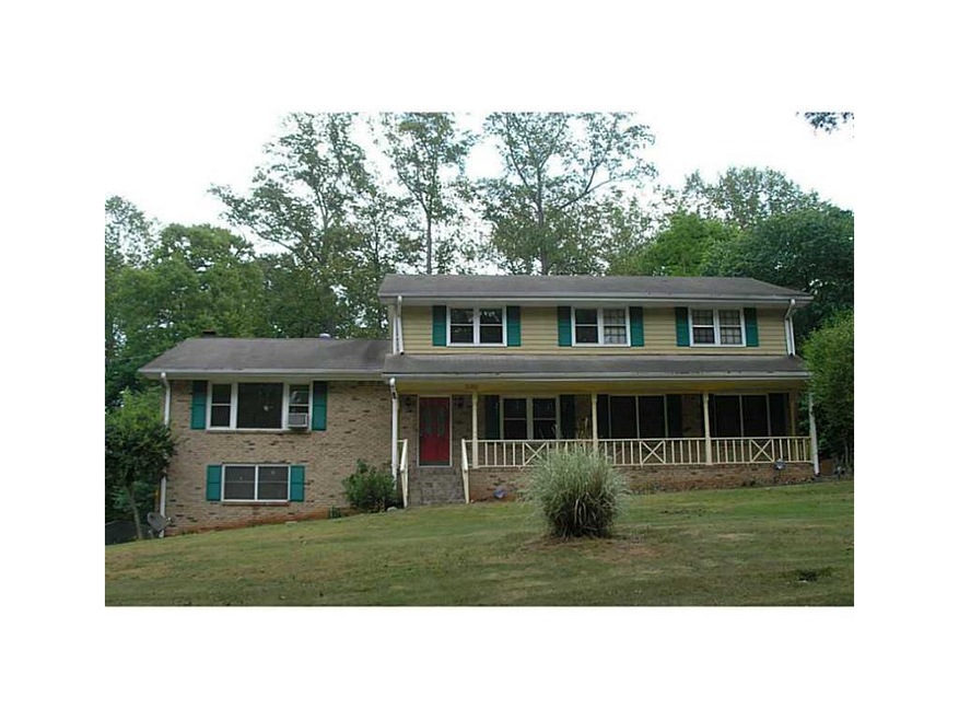 Exterior Front. Gorgeous Brick Home on Partial bas
