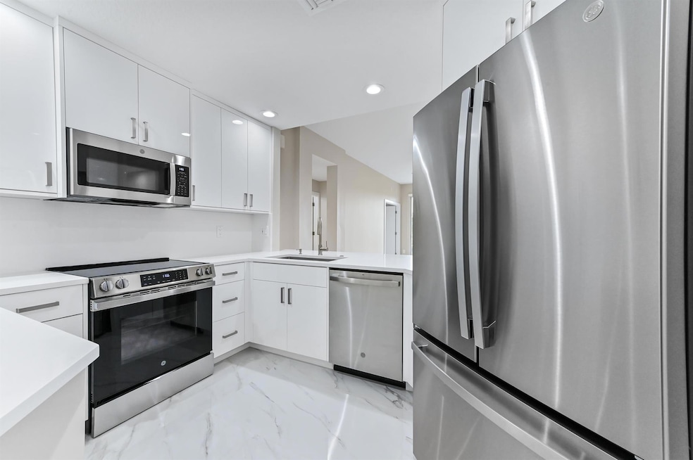 12510 Crystal Pointe Dr unit 102, Boynton Beach, FL 33437 - photo 1