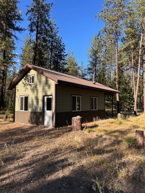 View of home's exterior with a metal roof
